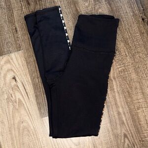 STRUT-THIS Black leggings with colored pinstripe